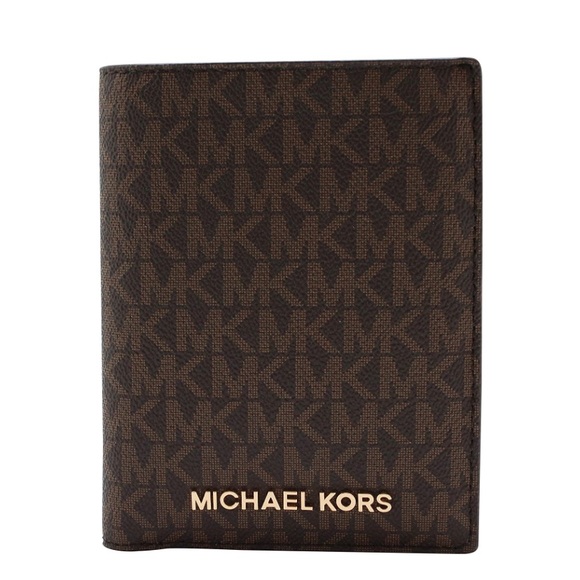 Michael Kors Handbags - Michael Kors Jet set monogram passport wallet.
